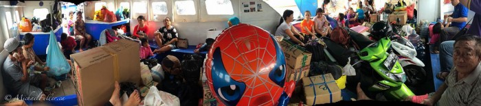 Another overcrowded ferry, this one smaller.