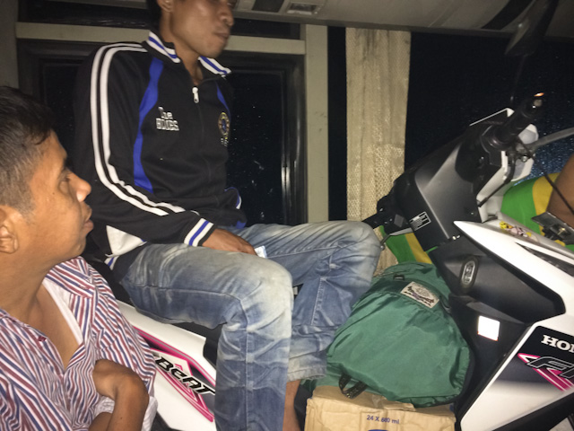 Unusual bus cargo. But an extra seat.